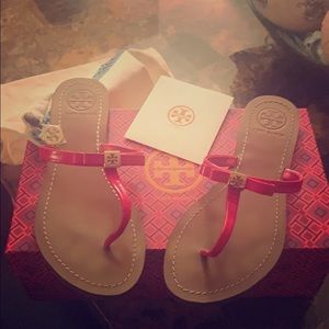 Tory Burch sandals.